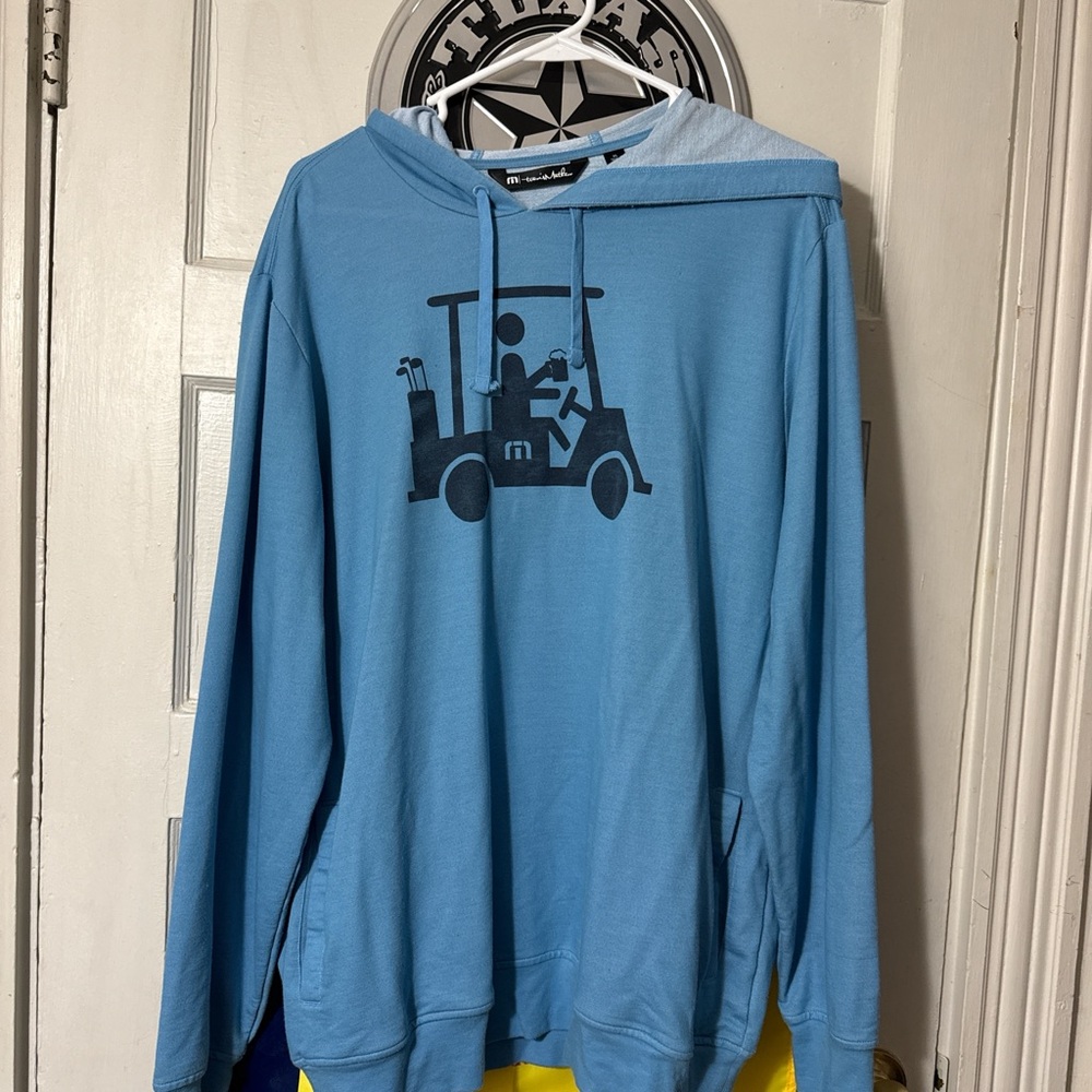 Travis Mathew Blue Hoodie with Golf Cart Design
